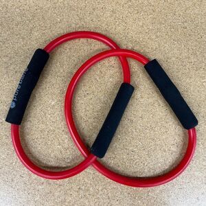 Pure Barre Red Resistance Rings with Black Foam Grips